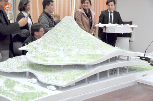 金門縣政府昨日召開金門港水頭客運中心新建工程規劃設計審查會議,圖為客運中心設計模型。
(李增汪攝)